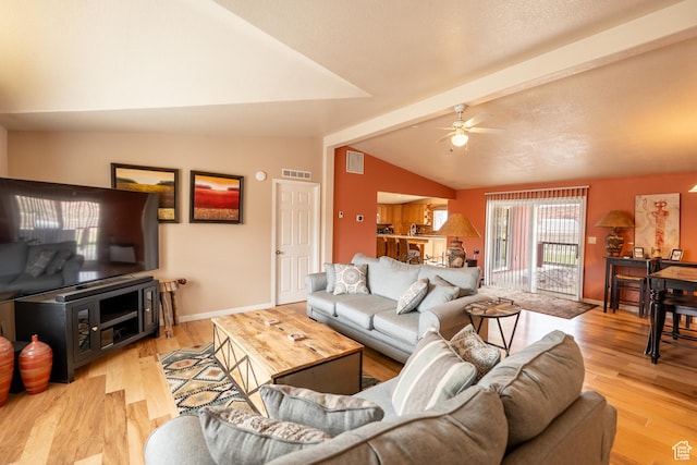 69 E Coronado Ln, Moab, UT 84532 - living area featuring visible vents, vaulted ceiling with beams, wood finished floors, and a ceiling fan