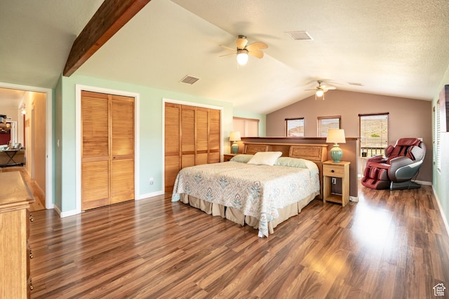 69 E Coronado Ln, Moab, UT 84532 - bedroom featuring wood finished floors, vaulted ceiling with beams, visible vents, and multiple closets