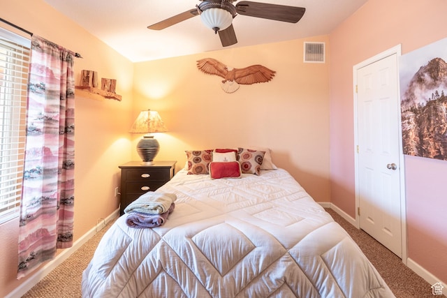 69 E Coronado Ln, Moab, UT 84532 - bedroom featuring a ceiling fan, vaulted ceiling, visible vents, carpet flooring, and baseboards