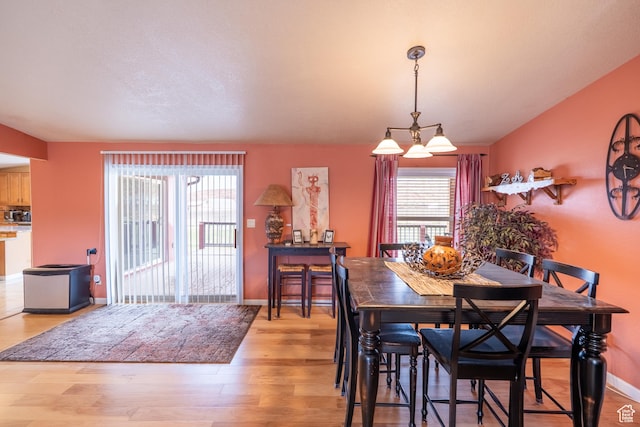 69 E Coronado Ln, Moab, UT 84532 - dining area with light wood finished floors and baseboards