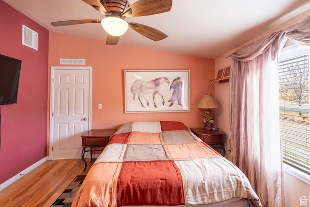 69 E Coronado Ln, Moab, UT 84532 - bedroom featuring visible vents, ceiling fan, light wood-type flooring, and lofted ceiling
