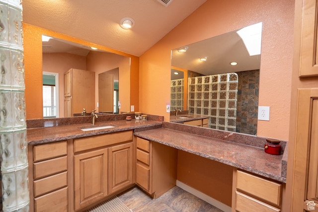 69 E Coronado Ln, Moab, UT 84532 - bathroom with vanity, recessed lighting, lofted ceiling, and walk in shower