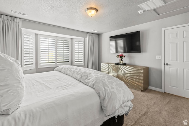 11534 S Rk Cv, South Jordan, UT 84095 - bedroom with carpet flooring, a textured ceiling, baseboards, and attic access