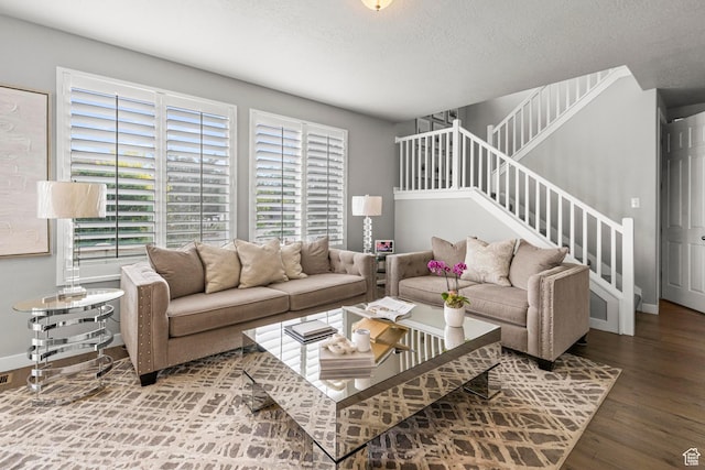 11534 S Rk Cv, South Jordan, UT 84095 - living room with wood finished floors, stairs, a textured ceiling, and baseboards