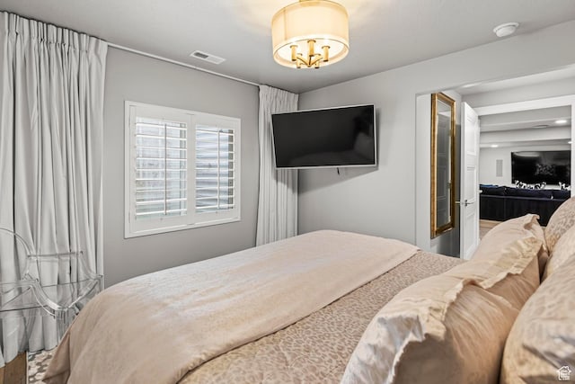 11534 S Rk Cv, South Jordan, UT 84095 - bedroom with a chandelier