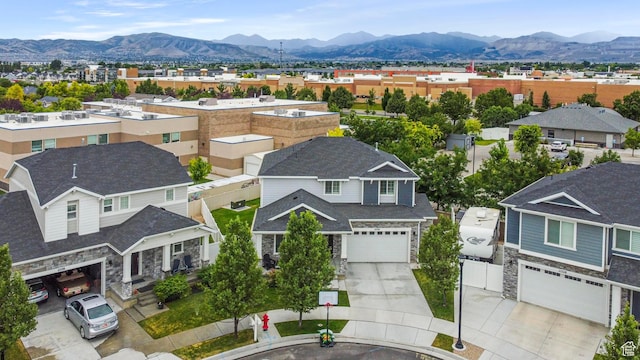 11534 S Rk Cv, South Jordan, UT 84095 - aerial view of residential area with a mountain backdrop