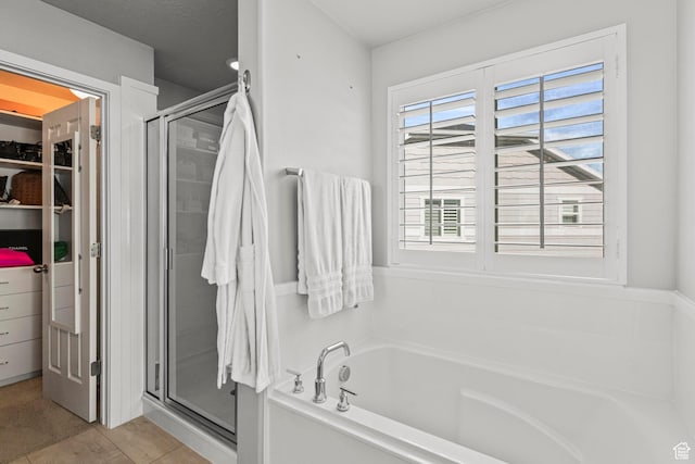 11534 S Rk Cv, South Jordan, UT 84095 - bathroom with a stall shower, a bath, and a spacious closet
