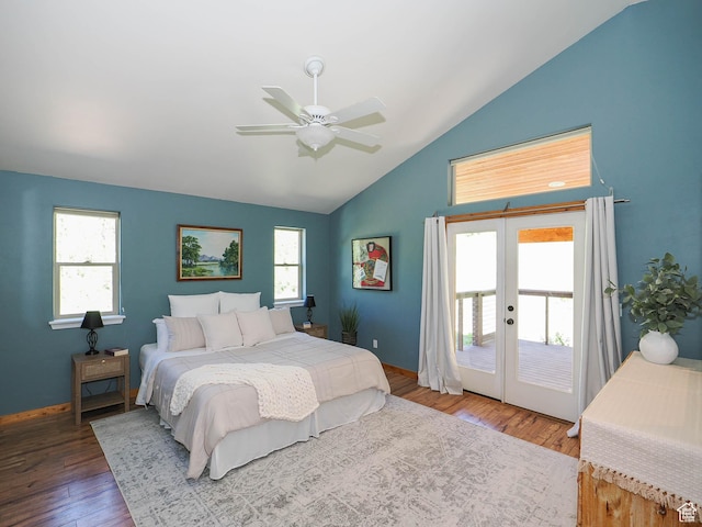 bedroom featuring access to outside, hardwood / wood-style floors, baseboards, and vaulted ceiling