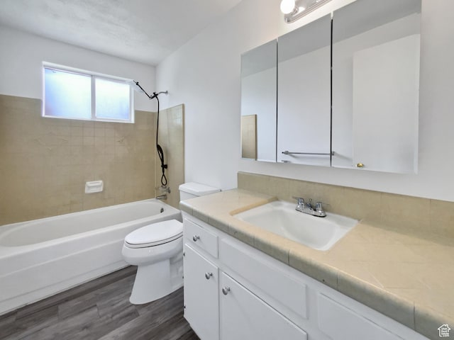 4445 S 4560 W, West Valley City, UT 84120 - bathroom with toilet, shower / bath combination, wood finished floors, and vanity