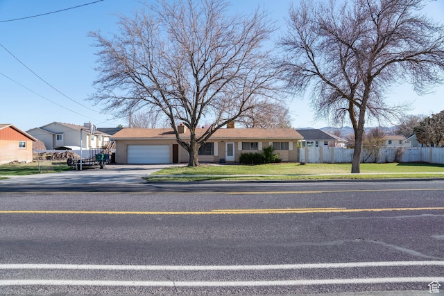 1915 W 13400 S, Riverton, UT 84065 - ranch-style house with a garage, driveway, a chimney, and a residential view
