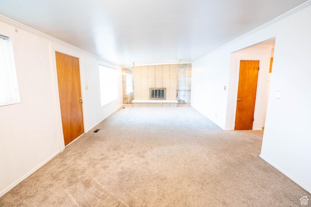 1915 W 13400 S, Riverton, UT 84065 - unfurnished living room featuring carpet floors, crown molding, a fireplace, and baseboards