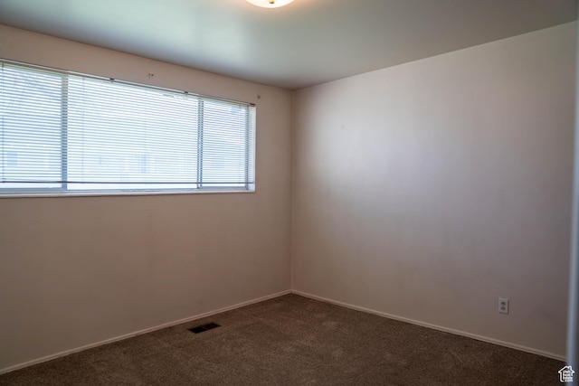 1915 W 13400 S, Riverton, UT 84065 - spare room featuring dark carpet and baseboards
