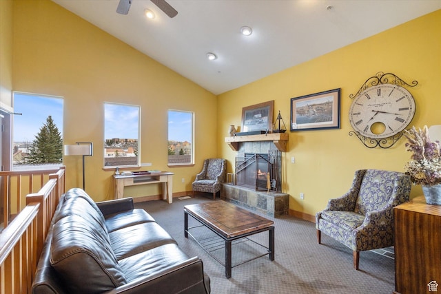 6749 N 2200 W Unit B302, Park City, UT 84098 - living room with baseboards, a tiled fireplace, a ceiling fan, vaulted ceiling, and carpet flooring