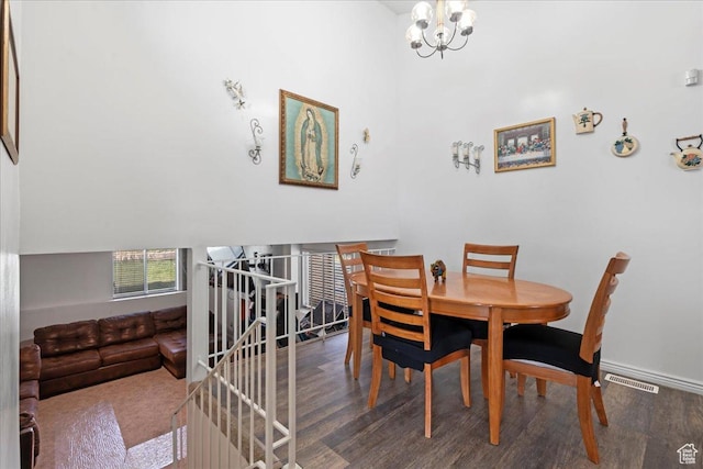 1107 E 2450 N, Layton, UT 84040 - dining space featuring a chandelier, wood finished floors, baseboards, and visible vents