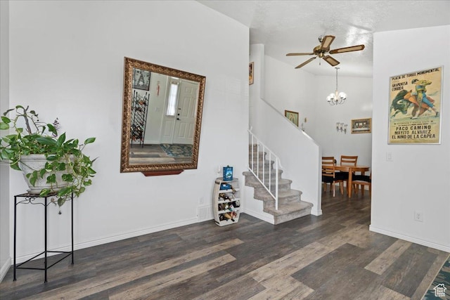 1107 E 2450 N, Layton, UT 84040 - entrance foyer featuring stairway, ceiling fan with notable chandelier, baseboards, and wood finished floors