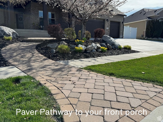 exterior space featuring a garage and driveway