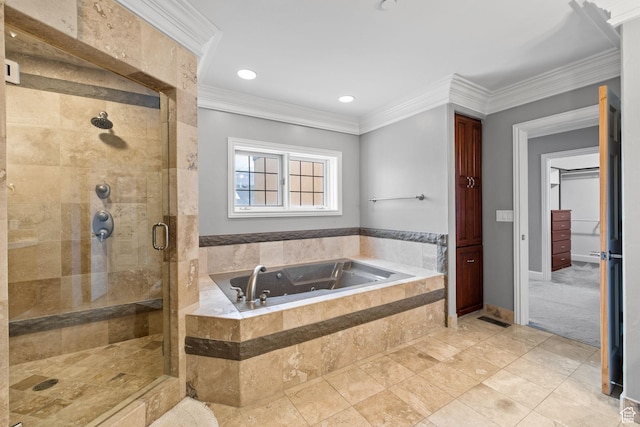 bathroom featuring ornamental molding, recessed lighting, a stall shower, and a garden tub