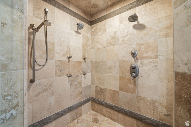 full bathroom with tiled shower