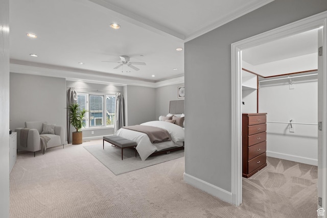 bedroom featuring ornamental molding, baseboards, and light colored carpet