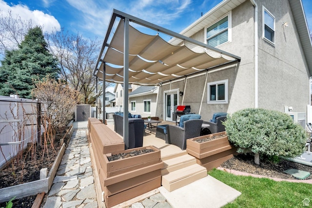 exterior space featuring an outdoor hangout area, a pergola, a grill, a fenced backyard, and a patio area