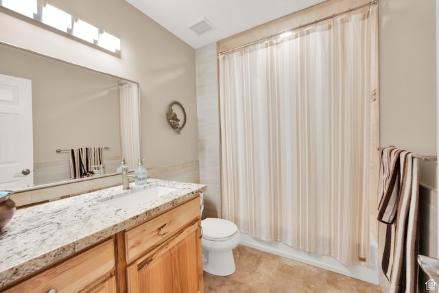 full bath with vanity, tile patterned flooring, visible vents, toilet, and shower / bath combo with shower curtain