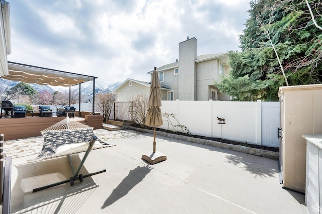 view of patio / terrace with fence