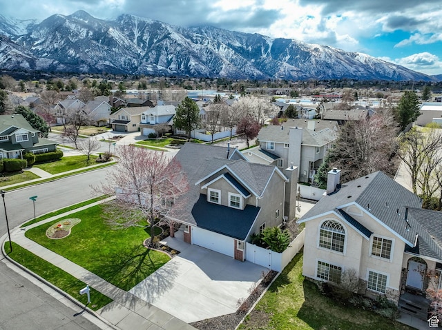 aerial view with a mountain view and a residential view