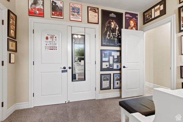 interior space featuring baseboards