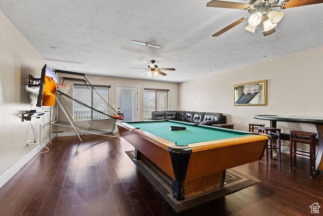 playroom with pool table, baseboards, a textured ceiling, a ceiling fan, and hardwood / wood-style floors