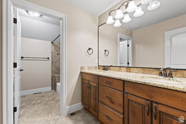 full bathroom featuring shower / bathing tub combination, double vanity, a sink, and visible vents