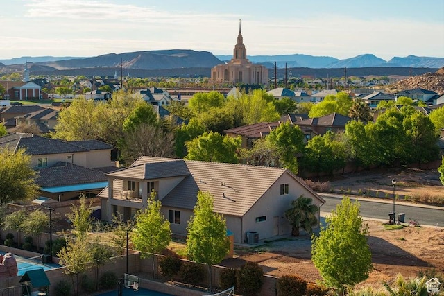 aerial view featuring a mountain view and a residential view