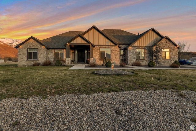 1737 E 6850 S, Uintah, UT 84405 - craftsman-style house featuring board and batten siding, a front lawn, stone siding, and roof with shingles