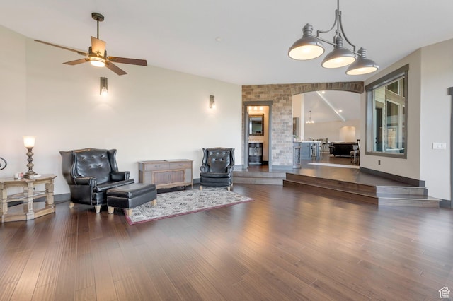 1737 E 6850 S, Uintah, UT 84405 - living area featuring arched walkways, a ceiling fan, lofted ceiling, and wood finished floors