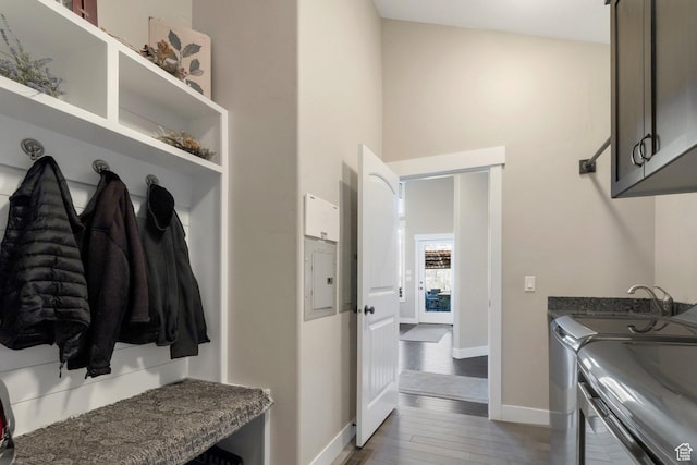 1737 E 6850 S, Uintah, UT 84405 - washroom featuring cabinet space, baseboards, independent washer and dryer, and wood finished floors