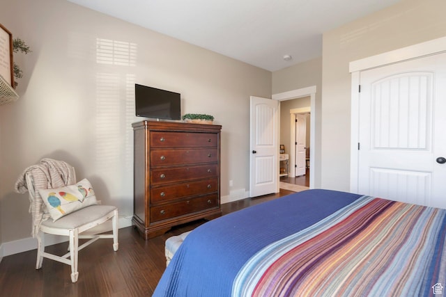 1737 E 6850 S, Uintah, UT 84405 - bedroom with dark wood finished floors, baseboards, and a closet