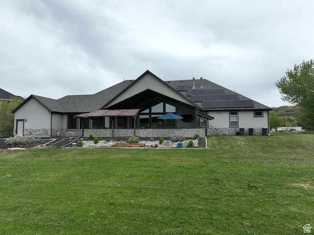 1737 E 6850 S, Uintah, UT 84405 - rear view of house featuring stone siding, a yard, and a shingled roof