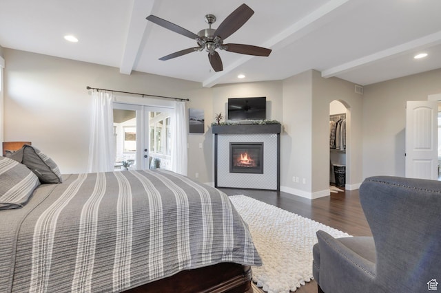 1737 E 6850 S, Uintah, UT 84405 - bedroom with beamed ceiling, french doors, wood finished floors, arched walkways, and a spacious closet