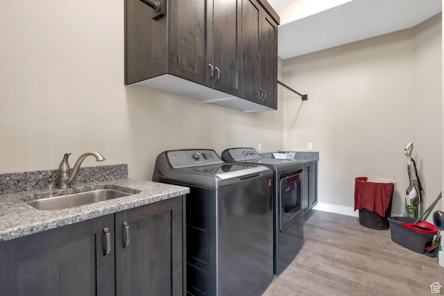 1737 E 6850 S, Uintah, UT 84405 - washroom with independent washer and dryer, cabinet space, light wood-type flooring, and baseboards