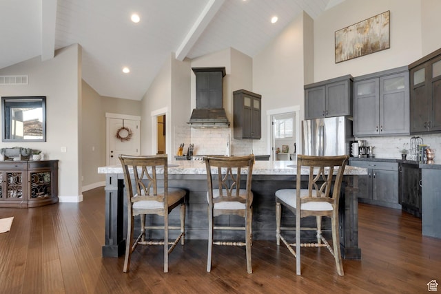 1737 E 6850 S, Uintah, UT 84405 - kitchen featuring freestanding refrigerator, premium range hood, high vaulted ceiling, gray cabinetry, and dark wood-style floors