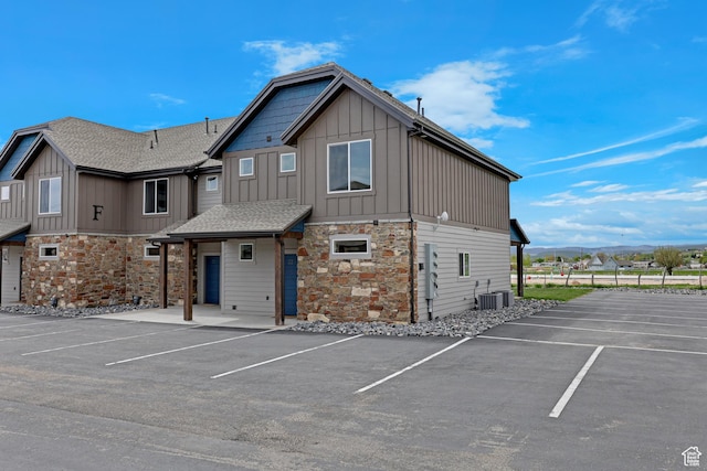 140 W 150 S Unit 22, Garden City, UT 84028 - view of building exterior with uncovered parking and central AC unit