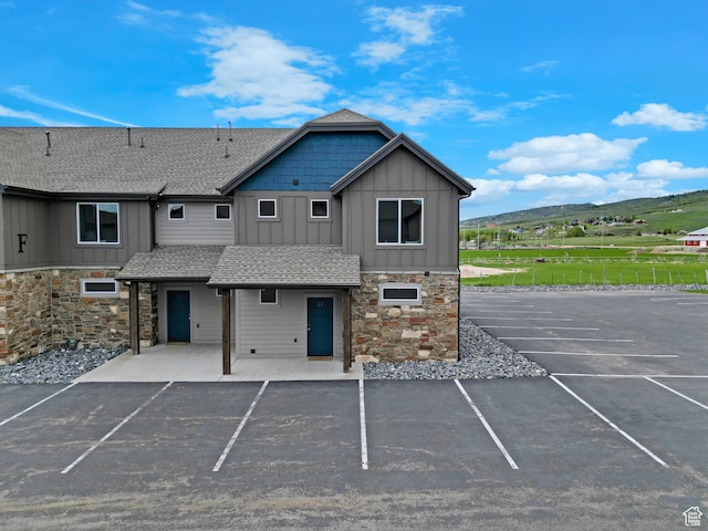 140 W 150 S Unit 22, Garden City, UT 84028 - view of building exterior featuring uncovered parking and a mountain view