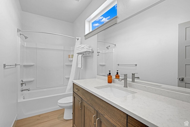 140 W 150 S Unit 22, Garden City, UT 84028 - bathroom with toilet, washtub / shower combination, wood finished floors, and vanity