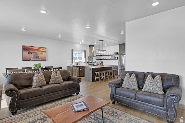 140 W 150 S Unit 22, Garden City, UT 84028 - living area with light wood-type flooring and recessed lighting