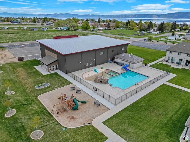 140 W 150 S Unit 22, Garden City, UT 84028 - aerial view of a pool area and a water and mountain view