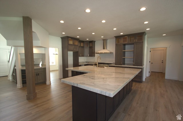 198 N 600 E, Hyrum, UT 84319 - kitchen with wood finished floors, wall chimney range hood, open shelves, and a spacious island