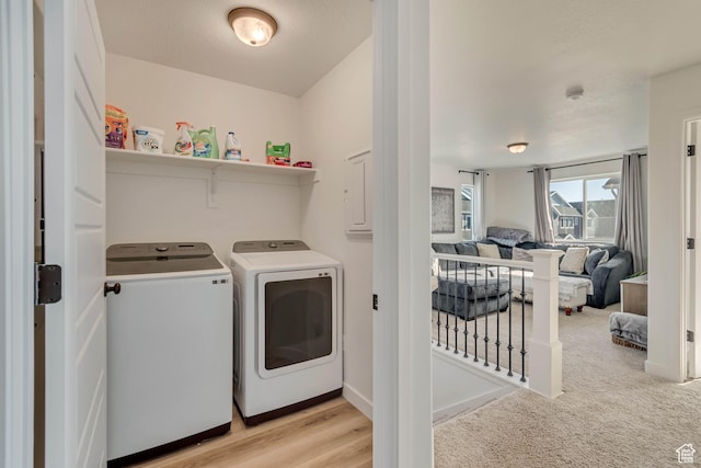 laundry area featuring laundry area and washer and clothes dryer