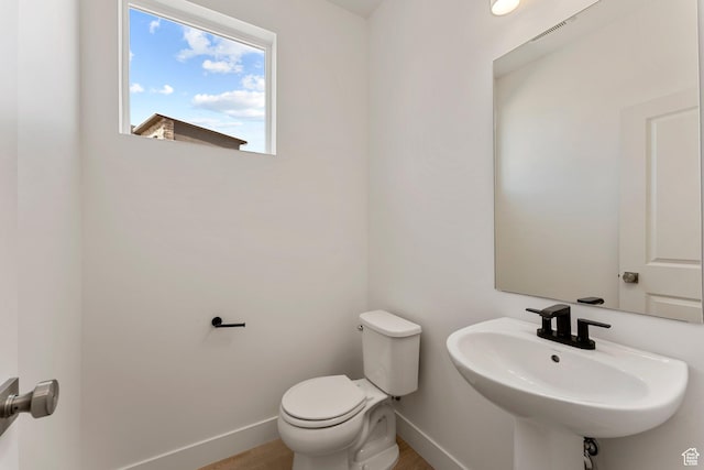 516 W Olive Ln, St George, UT 84790 - half bath with toilet and wood finished floors