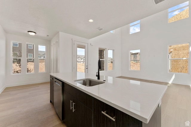 516 W Olive Ln, St George, UT 84790 - kitchen with light wood-style flooring, plenty of natural light, dishwasher, light countertops, and recessed lighting