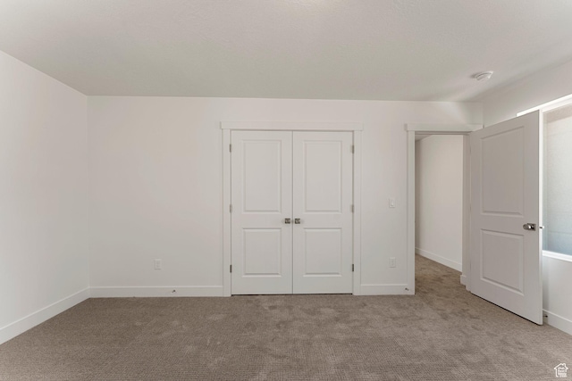 516 W Olive Ln, St George, UT 84790 - unfurnished bedroom with carpet flooring and a closet