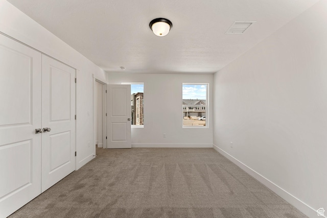 516 W Olive Ln, St George, UT 84790 - unfurnished bedroom featuring carpet and baseboards